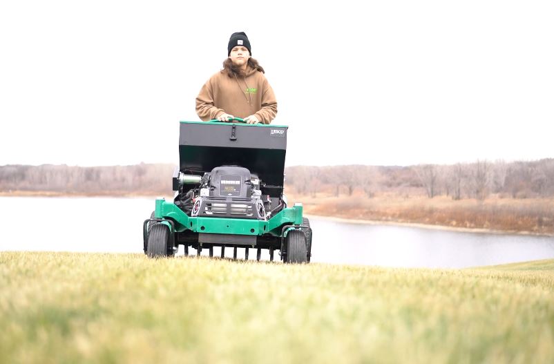 Lawn aeration service improving the quality of the lawn in spring.