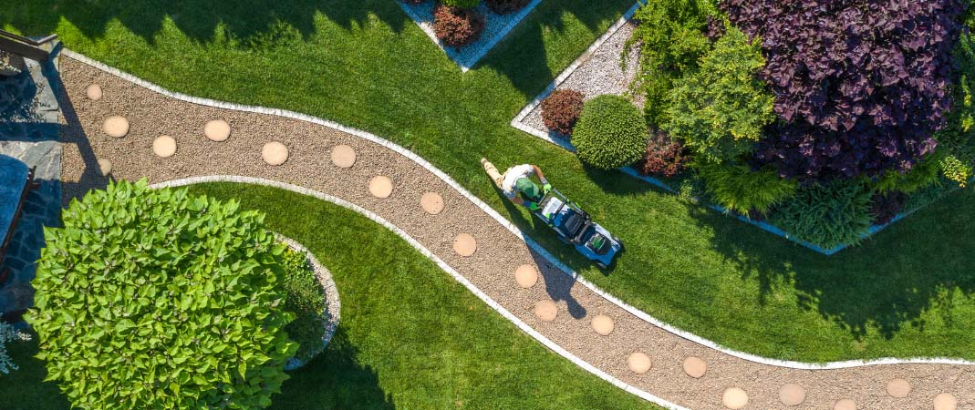Excel Lawn & Landscape is more than just a mowing service. We’re a full-service lawn care provider in Des Moines, IA, renowned for our commitment to quality and customer satisfaction. Our team’s expertise is recognized by our A+ rating with the Better Business Bureau of Greater Iowa, a testament to our unwavering dedication to lawn care excellence. Here’s an overview of the diverse services we offer: Customized Landscape Design and Installation: Whether you’re envisioning a serene garden with elegant water features or a practical outdoor living space, our team is skilled in both hardscape (like walkways, patios, and decorative walls) and softscape (such as planting vibrant flowers, shrubs, and trees) elements. We bring your landscaping dreams to life with our creative designs and quality installations. Comprehensive Lawn Care and Maintenance: Our services extend to complete lawn care, ensuring your grass stays healthy and lush throughout the year. This includes regular maintenance, soil nourishment, and disease prevention strategies tailored to the unique climate and soil conditions of Des Moines. Seasonal Services: We understand the challenges of changing seasons in Des Moines. Our team is equipped to handle snow removal during the winter months, ensuring your property remains safe and accessible. Additionally, we offer specialized seasonal services like spring clean-up and fall leaf removal to keep your landscape pristine year-round. Fertilization, Weed, and Pest Control: A healthy lawn is more than just regular mowing. We provide expert fertilization services, effective weed management, and eco-friendly pest control solutions to ensure your lawn remains a vibrant and enjoyable space. For a free estimate and to discover how our Mowing Service in Des Moines can transform your lawn into a vibrant, healthy landscape, contact us today. We’re dedicated to your lawn’s health and your complete satisfaction in Des Moines, IA. Landscaping Service in Des Moines, IA